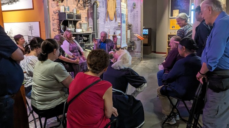 Seniors taking part in a "Tea & Tour" learning at the Museum of Surrey